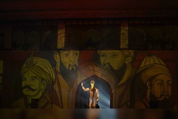 Celebrating India's Rich History: Red Fort Illuminated on World Heritage Day with National Flag Colors